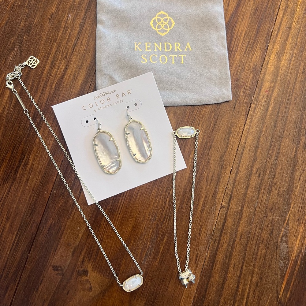Kenda Scott 3 piece set in gold with ivory mother of pearl stone.